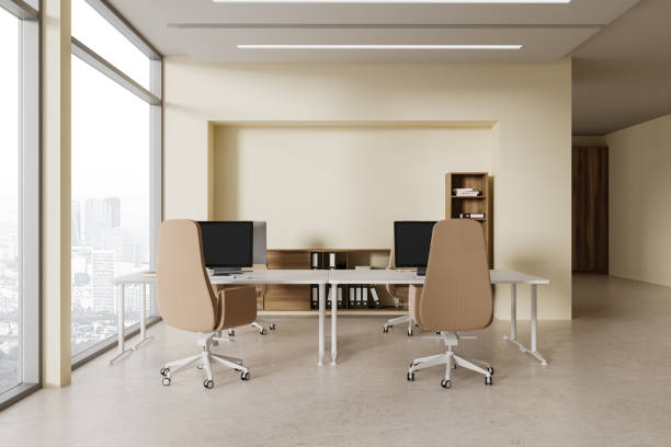 istock Beige business work zone interior with desk and computers, panoramic window 1778418514