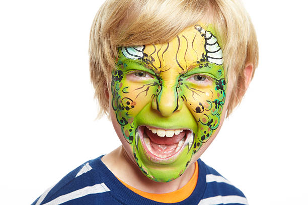 istock Young boy with face painting monster 177843756