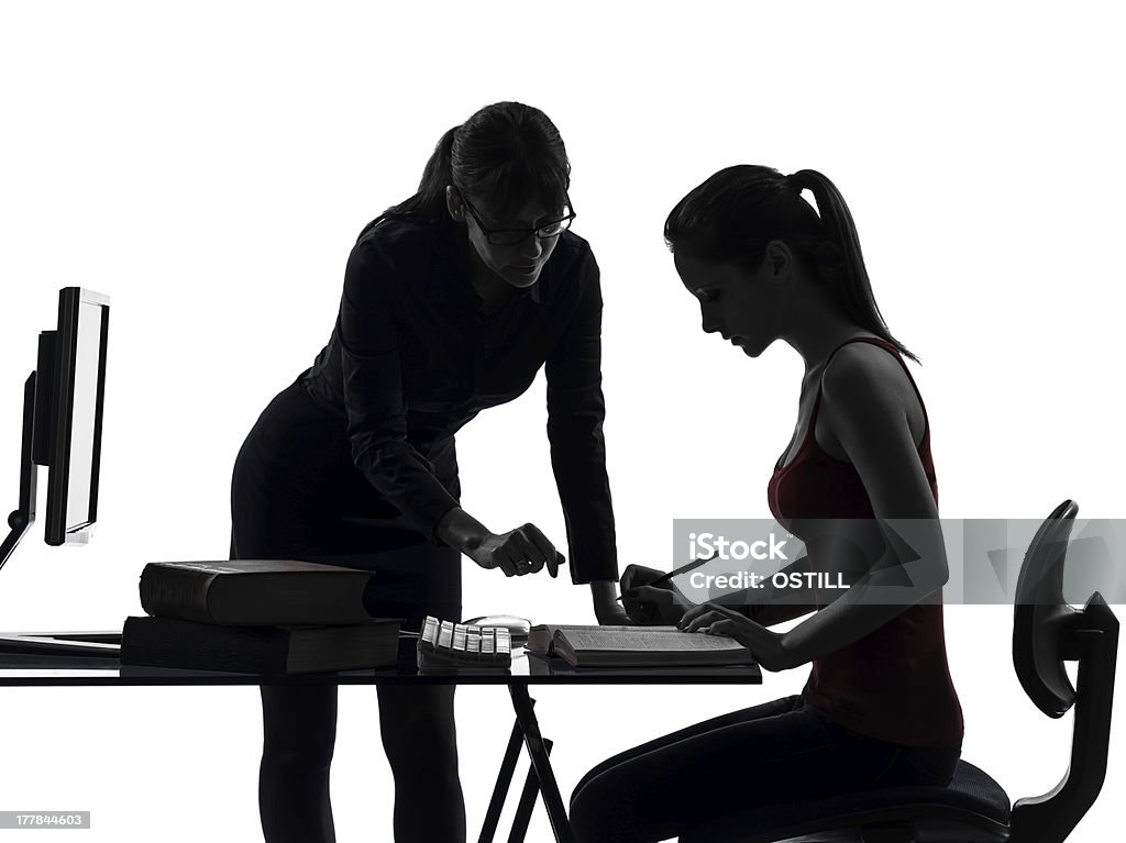 teacher woman mother teenager girl studying silhouette one caucasian teacher woman mother teenager girl studying  in silhouette studio on white background In Silhouette Stock Photo