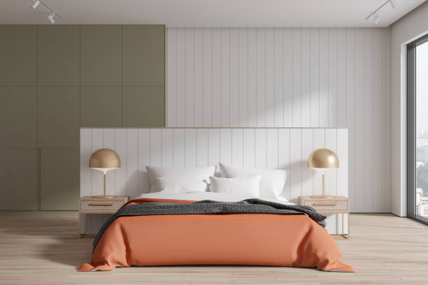 istock Elegant hotel bedroom interior with bed, accent wall and panoramic window 1778457169