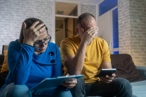 istock Upset couple thinking about high prices while looking at utilities, gas, electricity, rental charges, water bill due to inflation and crisis. 1778457235