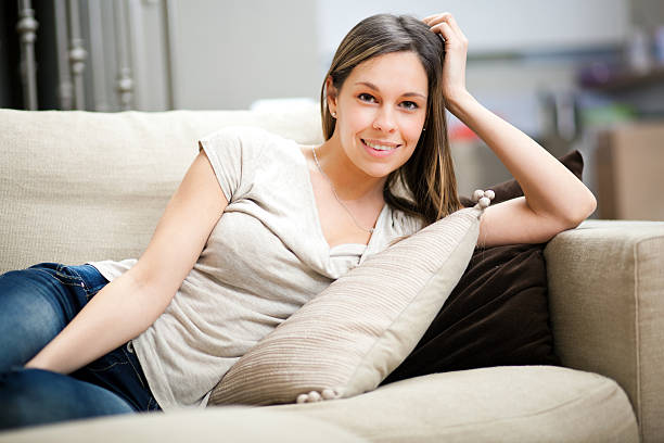 istock Young woman relaxing on the sofa 177846175