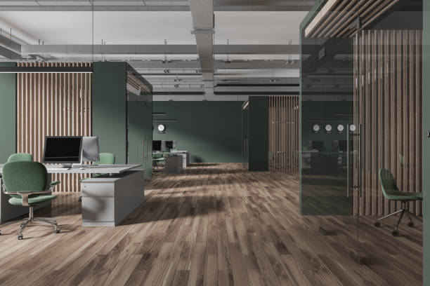 istock Modern office interior with workspace, pc computers in row and glass room 1778471026