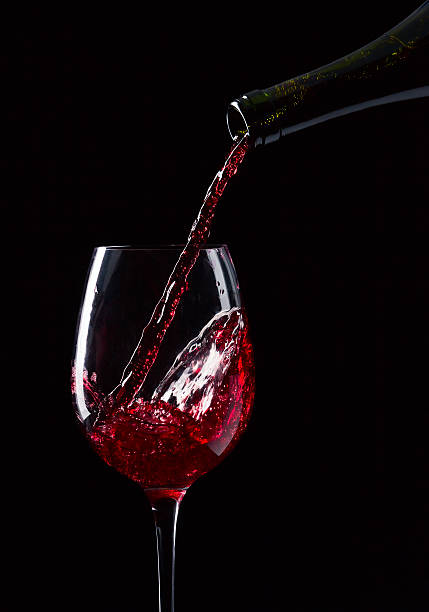 istock bottle and glass with red wine 177847959