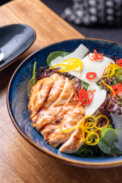 istock Healthy organic Chicken Caesar Salad. Caesar Salad with grilled chicken on plate. 1778483738