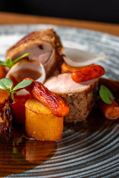 istock Tenderloin pork with vegetables and sauce gravy. 1778484351