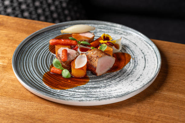 istock Tenderloin pork with vegetables and sauce gravy. 1778484353