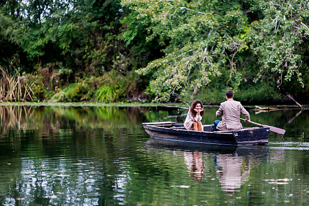 istock Young couple in the boat 177848782