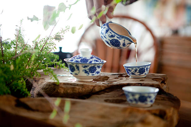 istock Tea water poured into Chinese blue and white porcelain teacup 177848832