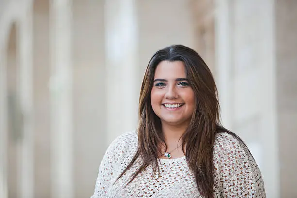 Photo of Portrait of a overweight woman smiling