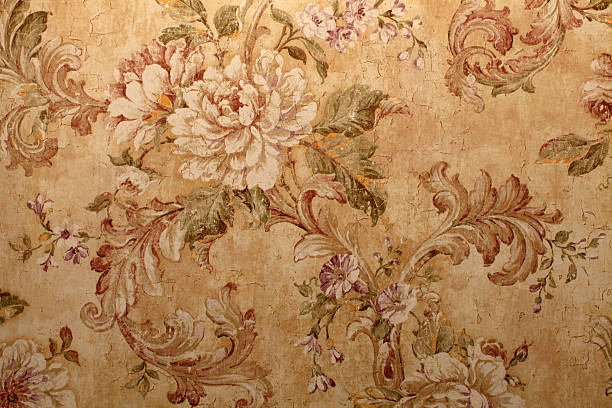 Close-up of beige vintage wallpaper with floral pattern Vintage golden run-down victorian wallpaper with baroque floral pattern baroque style stock pictures, royalty-free photos & images