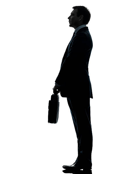 istock business man standing proflie silhouette 177849488