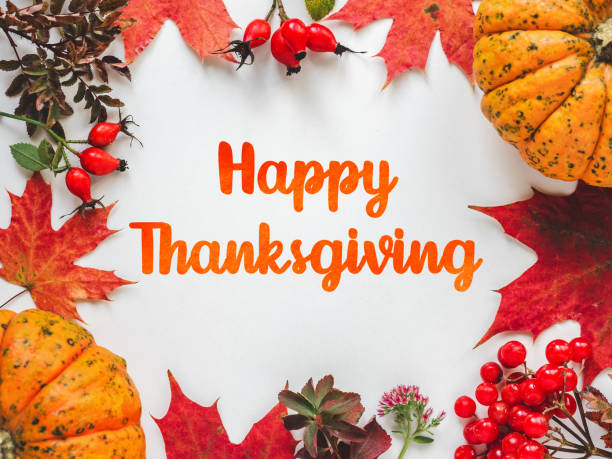 istock Happy Thanksgiving. Bright pumpkins, leaves and red berries 1778500007