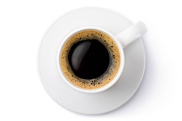 istock White ceramic coffee mug on the saucer. Top view. 177850127