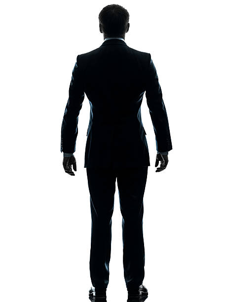 istock business man standing rear view silhouette 177850343
