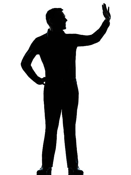istock one business man saluting silhouette 177850351