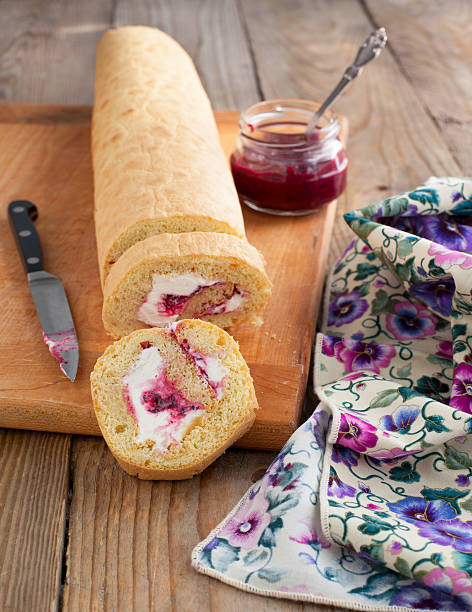 istock Homemade swiss roll with whipped cream and black currant jam 177850544