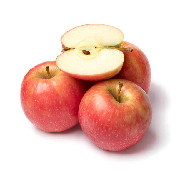 istock Whole and halved Pink Lady apples isolated  on white background 1778518511