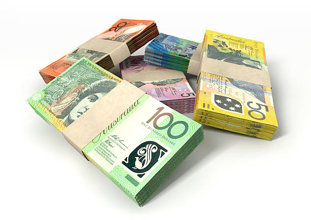 Australian Dollar Notes Bundles Stack A stack of bundled australian dollar notes on an isolated background australian dollar stock pictures, royalty-free photos & images