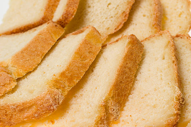 Closeup of sliced bread with golden crust stock photo