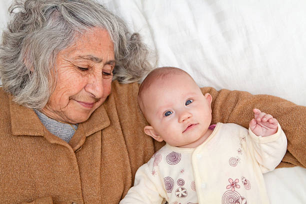 istock Great Grandma Laying Down With Baby 177853425