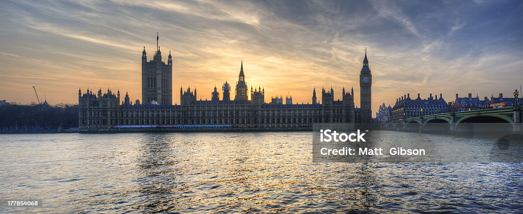 Big Ben and Houses of Parliament London panorama Big Ben and Houses of Parliament during Winter sunset. Architecture Stock Photo