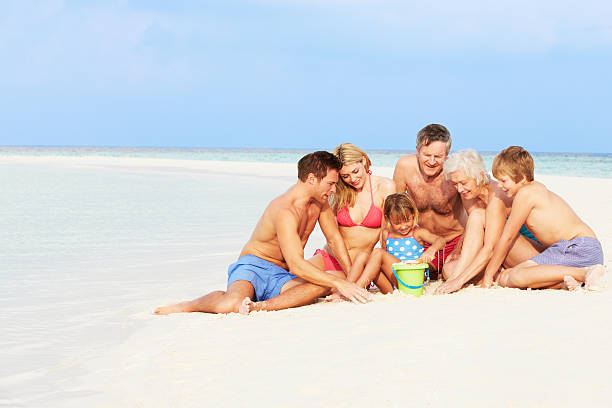 istock Multi Generation Family Having Fun On Beach Holiday 177854254