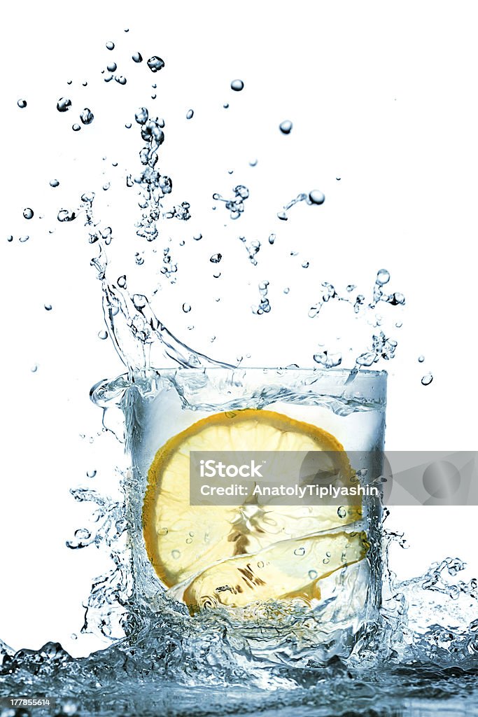 water splash in glass water splash in glass of  blue color Abstract Stock Photo