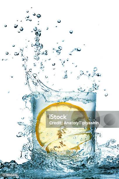 Water Splash In Glass Stock Photo - Download Image Now - Abstract, Backgrounds, Blue