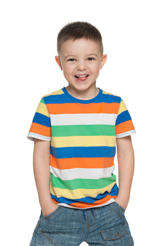 A portrait of a happy preschool boy; isolated on the white background