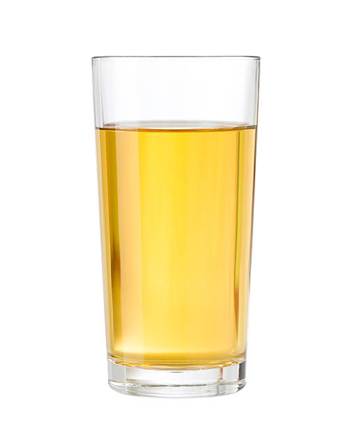 apple or grape clarified juice in glass isolated