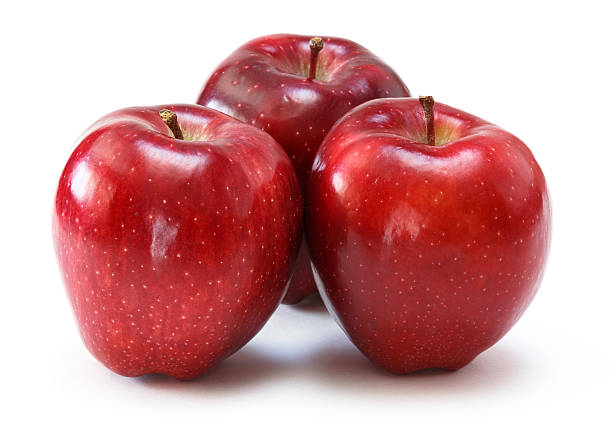 red apples red apples over white background red delicious apple stock pictures, royalty-free photos & images