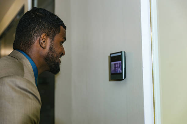 istock Man using face scanner to unlock door in office building. Access control facial recognition system. Biometric admittance control device for security system. Biometric admittance control device 1778572011