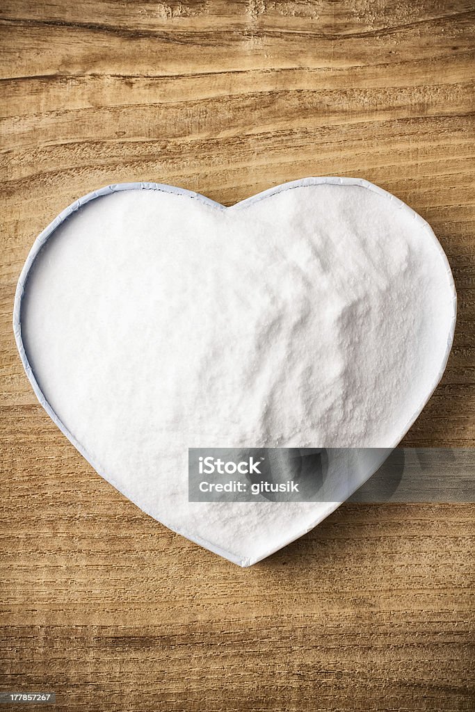 Soda. Soda, heart-shaped box. Wooden surface. Alkaline Stock Photo