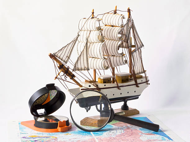 istock Yacht, a compass and magnifying glass on the map 177858176