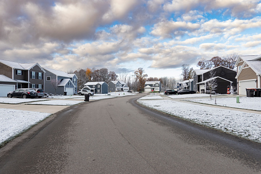 Photo of a street at a residential suburban city on winter, Caledonia, Michigan, USA