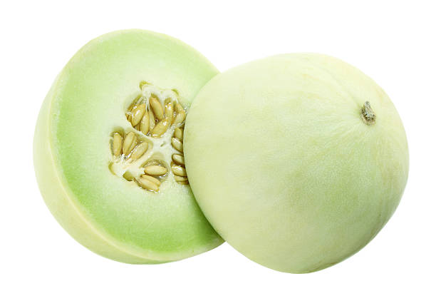 Honeydew Melon Honeydew Melon on White Background honeydew melon stock pictures, royalty-free photos & images