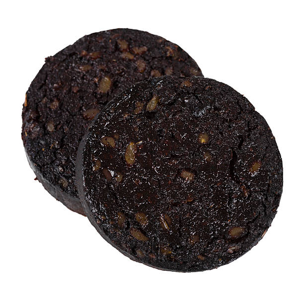 Black Pudding Black Pudding isolated on white. buristo stock pictures, royalty-free photos & images