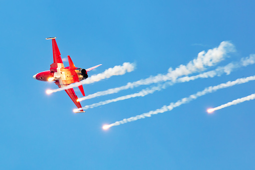 Radom, Poland - August 27, 2023: Swiss Air Force F-5E Tiger fighter jet plane flying. Aviation and military aircraft. Patrouille Suisse aerobatic team.