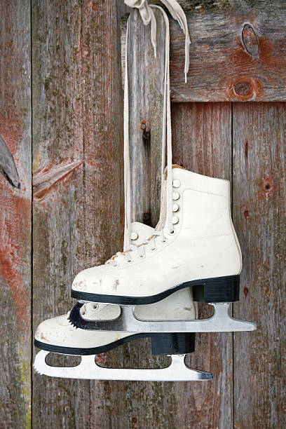 istock Old figure ice skates on a rustic wooden wall 177861894