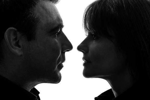 istock couple woman man facing each other silhouette 177862365