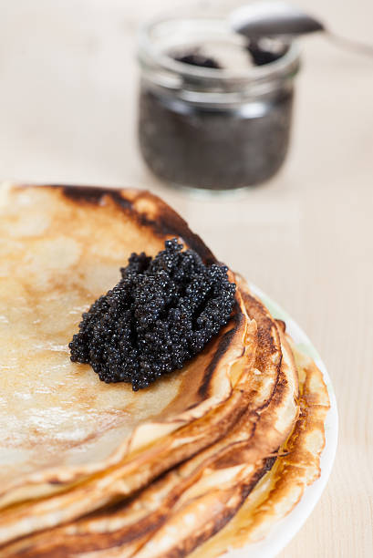 istock Pancakes with black caviar 177862683