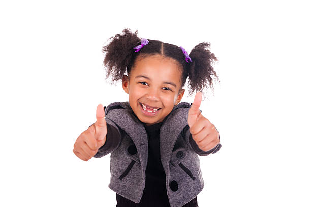 istock young african girl without teeth 177864037