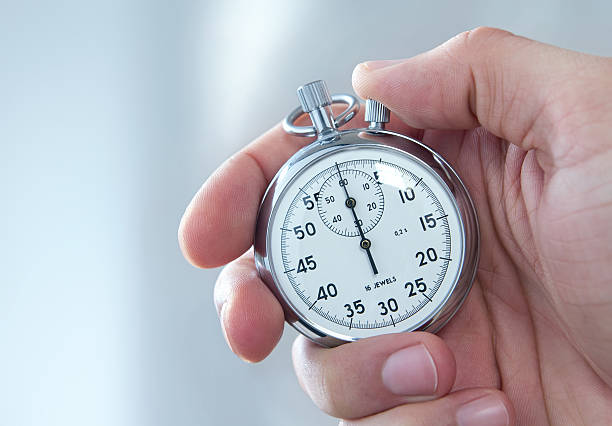 istock A man holding a stopwatch on his hand 177864047