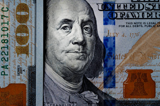 istock Closeup portrait Benjamin Franklin on 100 us dollar bill. 1778647158