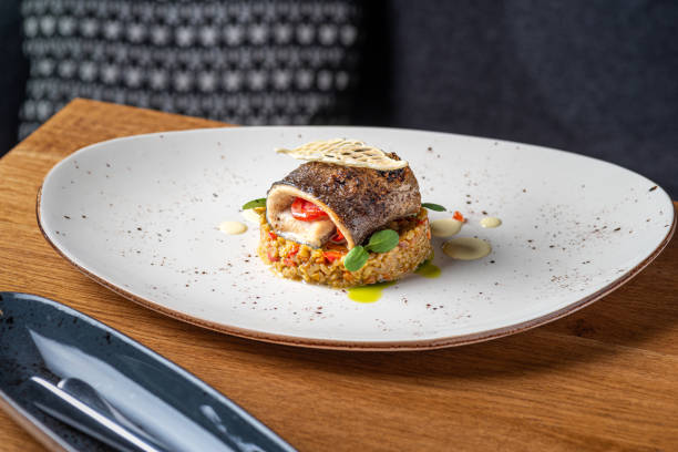 istock Trout with bulgur and vegetables in white bowl 1778649316