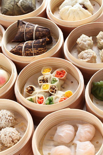 istock yumcha, dim sum in bamboo steamer 177865634