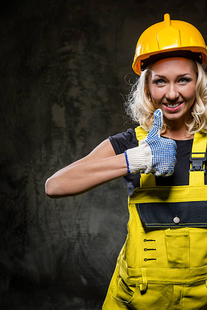istock Attractive builder woman with thumbs up 177865894