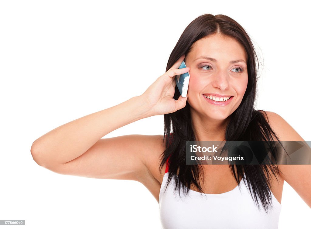 Bella mujer joven con el teléfono aislado - Foto de stock de Adulto libre de derechos