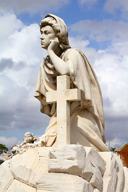 istock Sad woman - Camaguey cemetery 177866041